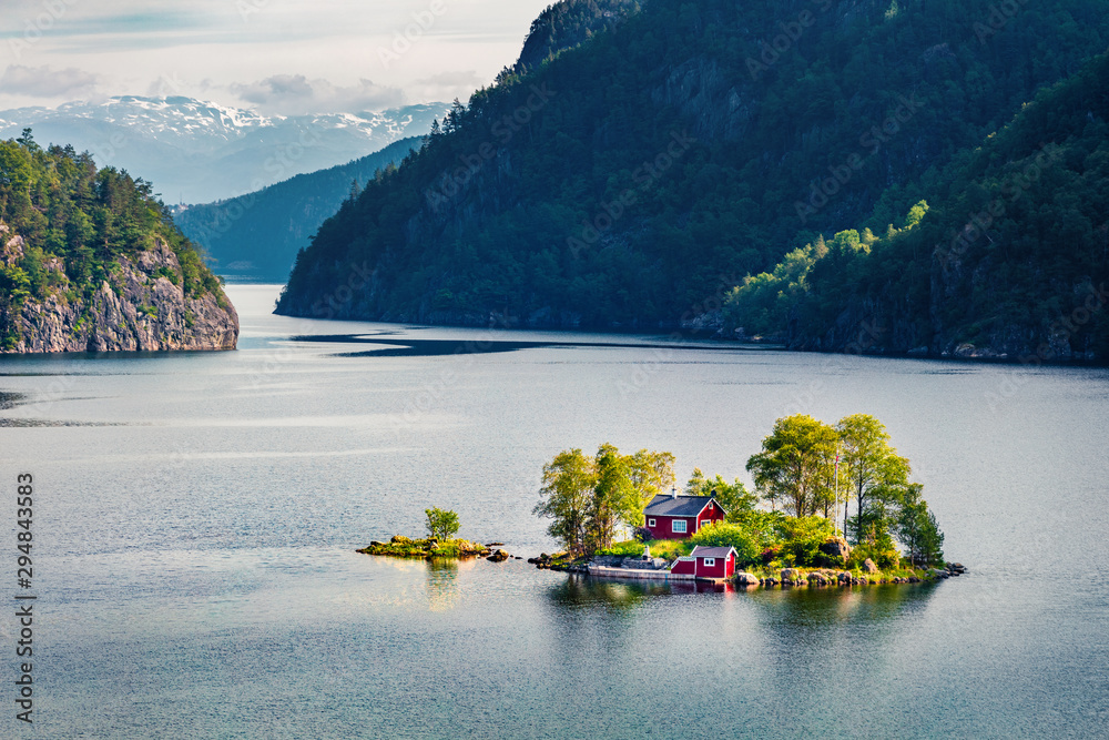 Magnificent summer view with small island with typical Norwegian building on Lovrafjorden flord, North sea. Colorful morning view in Norway. Beauty of nature concept background. - obrazy, fototapety, plakaty 