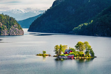 Magnificent Summer View With Small Island With Typical Norwegian Building On Lovrafjorden Flord, North Sea. Colorful Morning View In Norway. Beauty Of Nature Concept Background.