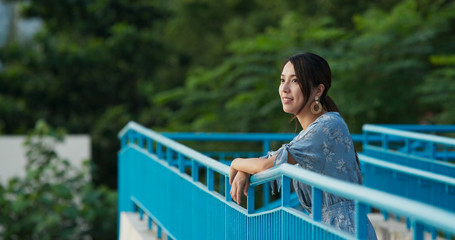 Poster - Woman look around the view in the park