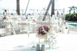 © irishasel - decorated for wedding elegant dinner table outdoors. Wedding at the sea in the summer. Oriental wedding