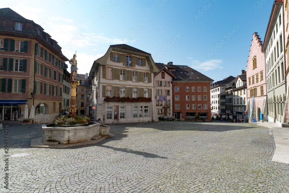 view of the Burgplatz Square and the historic fountain in the picturesque old town of Biel - obrazy, fototapety, plakaty 