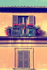 Rome window flowers. Vintage filtered colors.