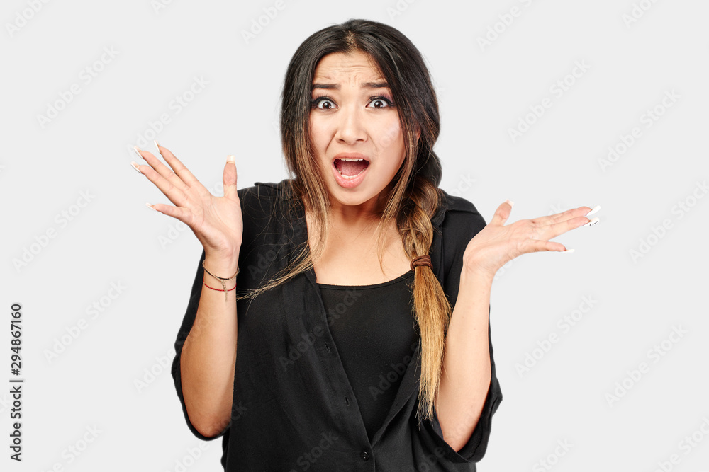 Daze Expression Stock-Foto „Portrait of perplexed Asian Kazakh girl with a dazed face ...