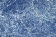 Texture of a blue stone-washed denim fabric