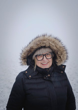 Portrait Of Senior Woman In Snow
