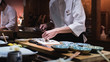 © Colin - Chef preparing slicing oysters, Omakase style Japanese traditional.