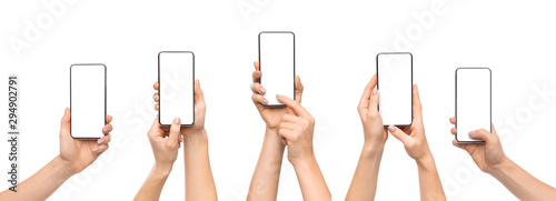 Fotografía Woman's hands using smartphone with blank screen over white background