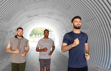 Sticker - fitness, sport and healthy lifestyle concept - young men or male friends running outdoors