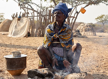 Old Mucubal Woman Cooking In The Traditional Way, Tchitundo Hulo, Virei, Angola