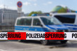 © OFC Pictures - Polizeiabsperrung einer Straße durch die Polizei in der Stadt