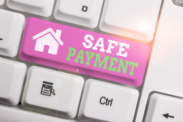 Text sign showing Safe Payment. Business photo showcasing webpage where credit card numbers are entered is secured White pc keyboard with empty note paper above white background key copy space