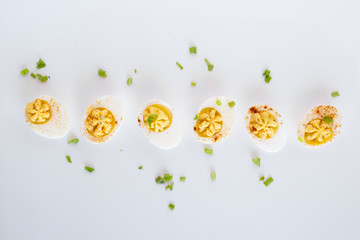 Wall Mural - Deviled Eggs on White Background