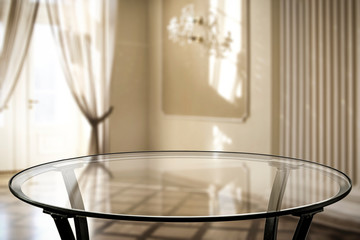 Wall Mural - glass coffee table of free space for your decoration and blurred background of window.