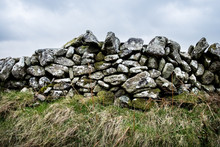 Close Up Of A Partially Collapsed Dry Stone Wall.