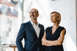 © Westend61 - Portrait of confident businessman and woman
