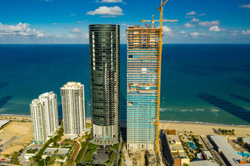 Fototapete - Aerial photo Porsche Design Tower and Turnberry Ocean Club luxury highrise condominiums on the beach