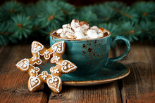Ceramic Mug Filled With Hot Chocolate  And Gingerbread Cookies