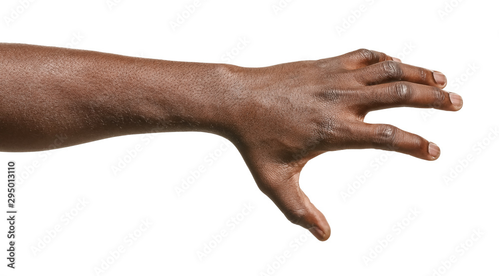 Hand of African-American man holding something on white background