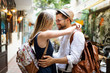 © NDABCREATIVITY - Summer holidays, dating, love and tourism concept. Smiling couple in the city