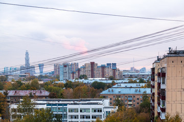 Wall Mural - blue sunset sky over residential district in city