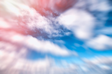 Wall Mural - blue and red sky with rapidly moving clouds, freedom and holiday concept