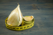 Elephant Garlic Garlic Cloves And Tape Measure