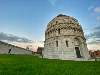 Wall Mural - Baptistery of Pisa at sunset, Field of Miracles, Tuscany, Italy