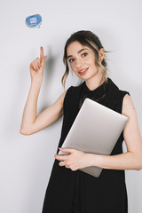 Young woman pointing at cyber monday sign