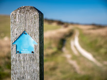A Direction Marker For The South Downs Way Public Footpath Which Runs 100 Miles Along The South Coast Of England Between Eastbourne And Winchester.