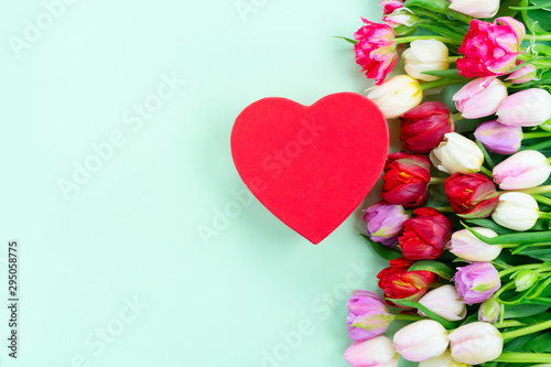 Fresh tulips flowers with heart