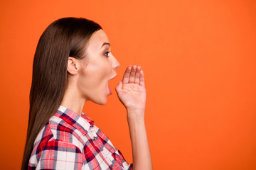 Sticker - Profile side view close-up portrait of her she nice attractive lovely straight-haired girl wearing checked shirt saying new info isolated on bright vivid shine vibrant orange color background