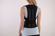 © dream@do - Attractive Woman with Posture Corrector. Scoliosis, Kyphosis treatment