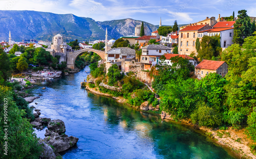 Mostar - iconic old town with famous bridge in Bosnia and Herzegovina. popular tourist destination - obrazy, fototapety, plakaty 
