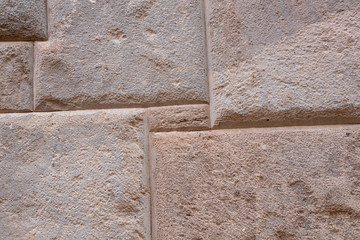 Natural stone abstract background wall made by ancient Inca of Peru in South America. Background with copy space