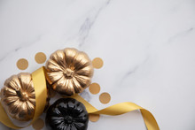 Luxury Gold And Black Autumn Pumpkin Flat Lay Composition On A Marble Background