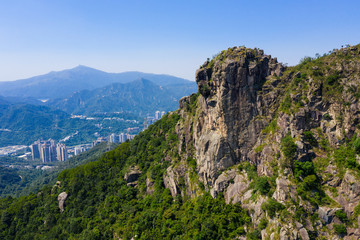 Wall Mural - Drone fly over Hong Kong lion rock mountain