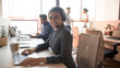 © fizkes - Happy young indian businesswoman call center agent looking at camera