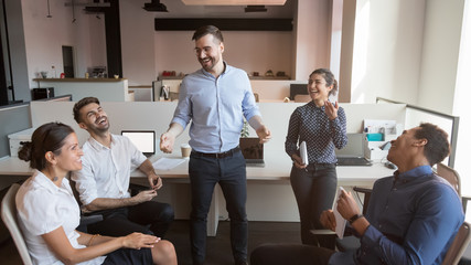 Sticker - Cheerful boss and diverse business team laughing at work break