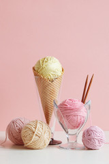 Wall Mural - Pastel colored ball of yarn in a dessert bowl and in a waffle cone.