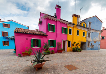 Facades of traditional old houses on the island of Burano.