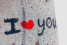 I Love You Lettering With A Bright Red Heart On A Gray Rough Concrete Surface