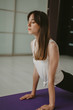 © glebchik - Young slender girl doing yoga
