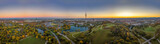 Fototapeta Paryż - Impressive total view over Munich at sunset with the Olympic Park.