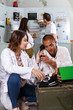 © JackF - Girl and guy checking telephone set in escape room