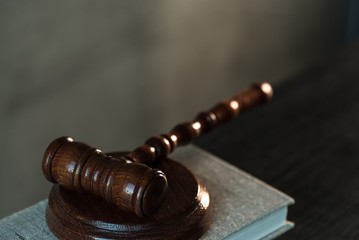 Poster - Law and Justice, judge gavel with scales on wooden table with blurred background.