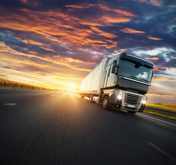 European truck vehicle with dramatic sunset light