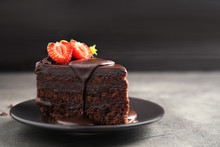 Delicious Fresh Chocolate Cake With Strawberry On Grey Table