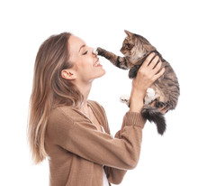 Young Woman With Cat On White Background. Owner And Pet
