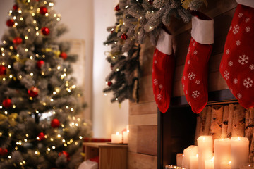 stylish room interior with decorative fireplace. christmas time