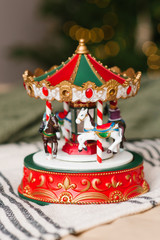 Christmas toy red white green carousel, close-up